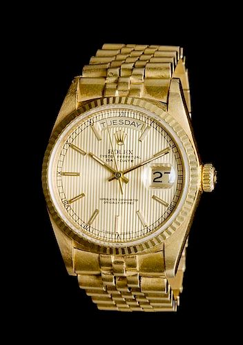 An 18 Karat Yellow Gold Ref. 18038 Oyster Perpetual Day-Date Wristwatch, Rolex, 86.30 dwts.