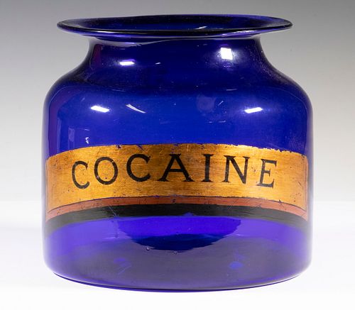 MEDIUM BLUE GLASS APOTHECARY JAR LABELED "COCAINE"