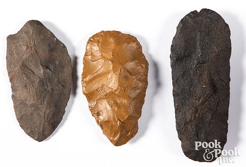 Three prehistoric stone blades