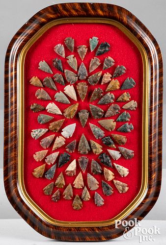 Group of colorful contemporary flint arrowheads.