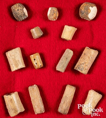 Various early shell and tubular bone beads