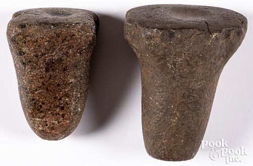 Two ancient stone bell and hoof type pestles