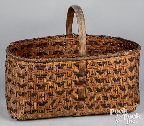 Woodlands Indian woven handle basket