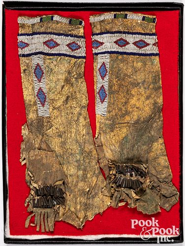 Pair of Plains Indian beaded hide leggings