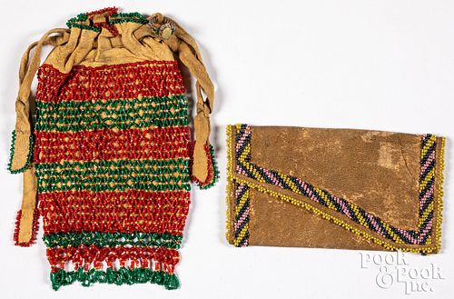 Two Plains Indian tanned hide leather pouches