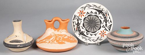 Four pieces of Navajo Indian decorated pottery