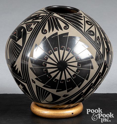Mata Ortiz matte on black pottery vessel