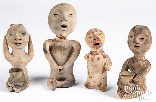 Group of four Tesque rain god figures, ca. 1900
