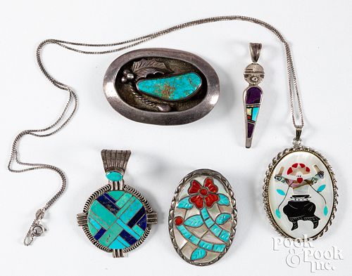 Two Zuni pendants
