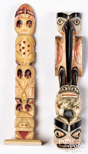 Two Pacific Northwest Coast Indian totem poles