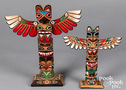 Two Pacific Northwest Coast Indian totem poles
