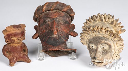 Two fragmentary clay heads, etc.