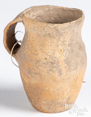 Ancient Chinese clay pitcher