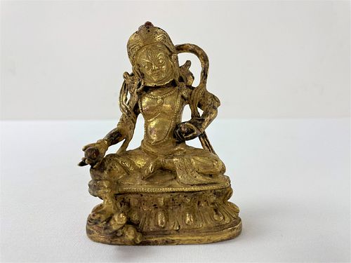 A Tibetan Gilt Bronze Buddha Figure 
