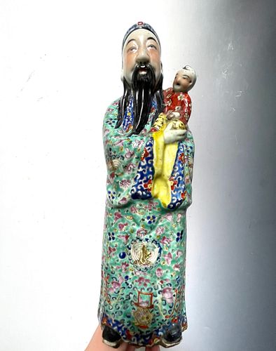 Antique porcelain figure