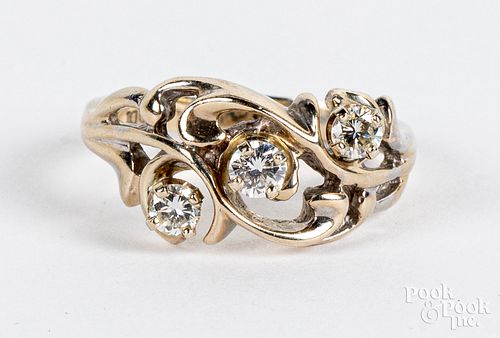 14K gold and three diamond ring, 2.7dwt, size 7.