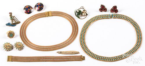 Group of costume jewelry.