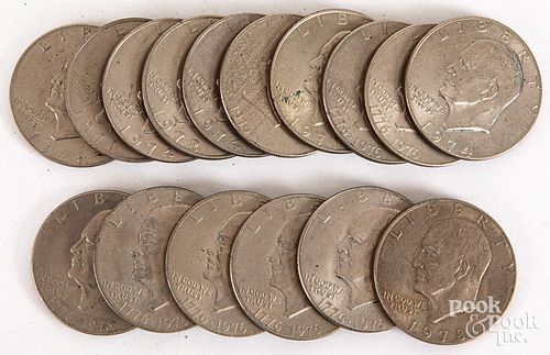 Fifteen Eisenhower silver dollars