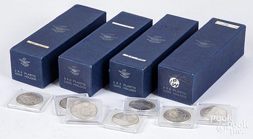 Ninety Morgan silver dollars, to include seventy-o