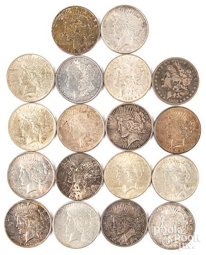 Eighteen silver dollars