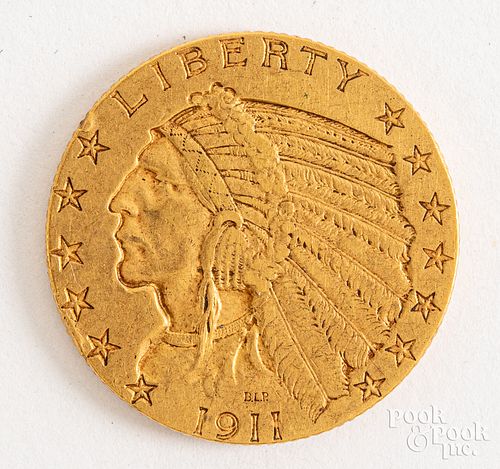 1911 five dollar Indian Head gold coin.