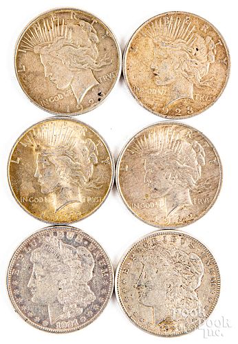 Six silver dollars, to include Peace & Morgan