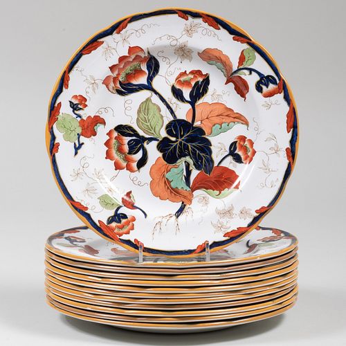 Set of Twelve Wedgwood Transfer Printed and Enriched Dinner Plates in the 'Water Nymph' Pattern 