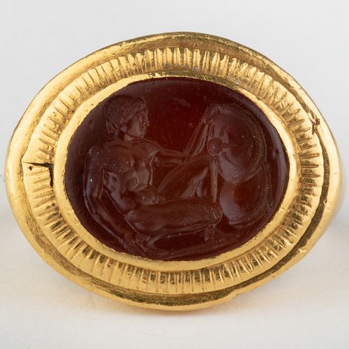 Ancient Carnelian Intaglio of a Warrior with his Shield, Set in a Ancient Roman Gold Ring