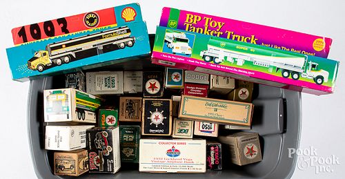 Large collection of toy trucks, cars, banks