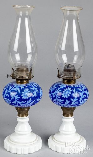 Pair of opalescent glass fluid lamps