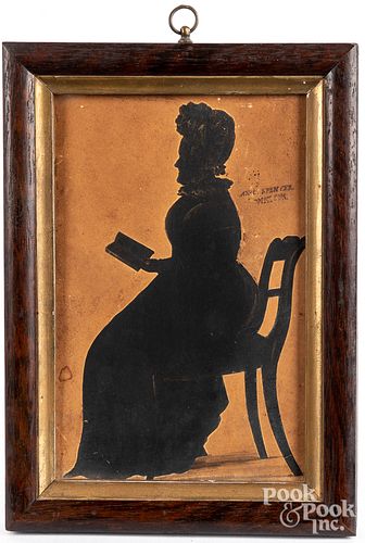 Cutwork silhouette of a seated woman, 19th c.