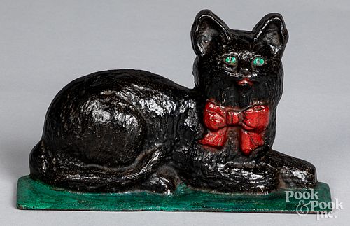 Household Patent Co. cast iron recumbent cat
