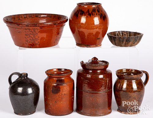 Seven pieces of Pennsylvania redware, 19th c.