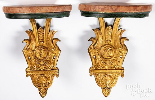 Pair of gilt bronze and marble wall shelves