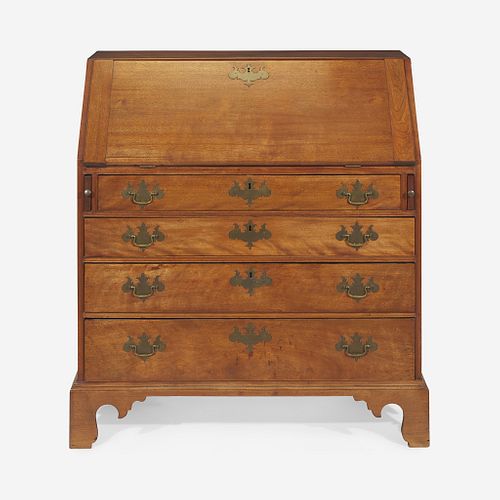 A Chippendale carved and figured walnut slant-front desk New England, late 18th century