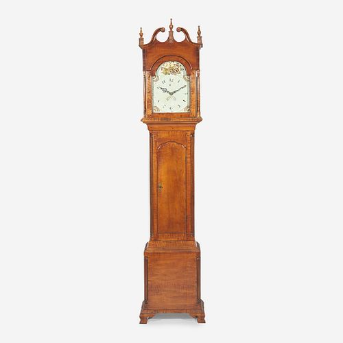 A Chippendale carved tiger maple tall case clock The face / works early 19th century, the case 20th century