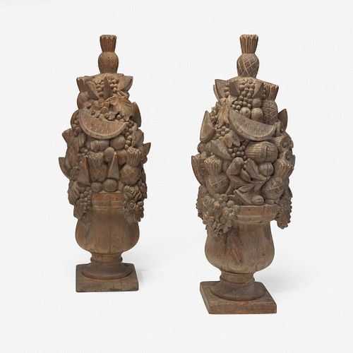 A pair of carved wooden fruit and flower arrangements circa 1855