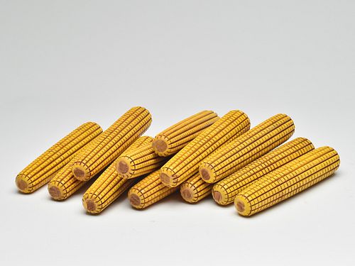 Very rare set of wooden corn cobs.
