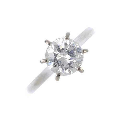 A diamond single-stone ring. The brilliant-cut diamond, to the pain band. Estimated diamond weight 1