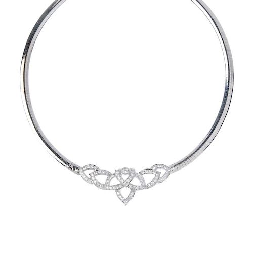 A diamond collar. The front designed as a brilliant-cut diamond collet, to the similarly-cut diamond