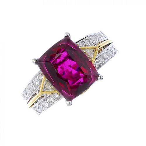 (193674) A tourmaline and diamond dress ring. Of bi-colour design, the rectangular-shape reddish pur