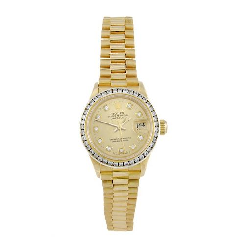 ROLEX - a lady's Oyster Perpetual Datejust bracelet watch. Yellow metal case stamped 18K with diamon