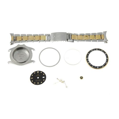 ROLEX - a selection of Oyster Perpetual GMT-Master II parts. To include the following. 1x bi-metal O