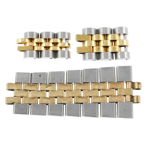 A group of four bi-metal Rolex bracelet sections together with a selection of bi-colour watch parts,