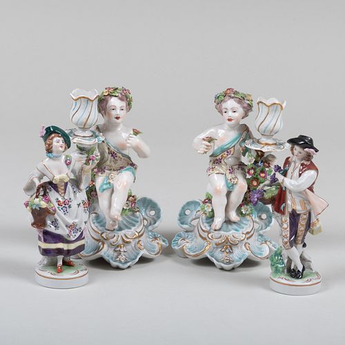 Pair of Chelsea Style Porcelain Figural Candlesticks and a Pair of Sitzendorf Style Porcelain Figures