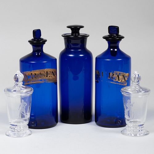 Three Blue Glass  Apothecary Jars and a Pair of Steuben Glass Jars and Covers