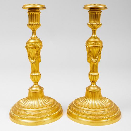 Pair of Continental Gilt-Bronze Candlesticks