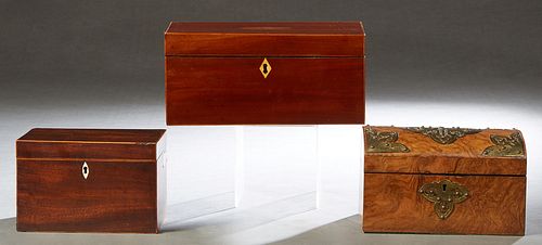 Group of Three English Boxes, 19th c., consisting of a brass mounted arched walnut example with a velvet lined interior and a key; a line inlaid mahog