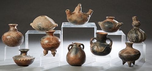 Group of Ten Pre-Columbian Style Pottery Vessels, 20th c., some with painted decoration, Gourd- H.- 8 1/4 in., Dia.- 5 1/2 in. Provenance: Palmira, th