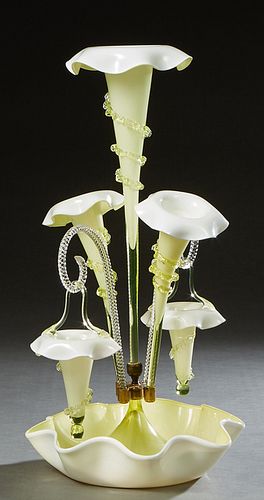 Fine Victorian Blown Cased Pale Yellow Glass Epergne, 19th c., with a central glass floriform trumpet vase, flanked by two angled floriform vases and 